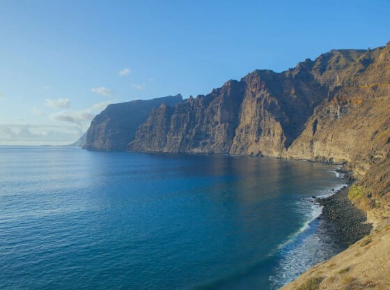An image collage containing 1 images, Image 1 shows Playa de los Gigantes - Tenerife Island landmark