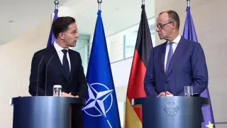 NATO Secretary General Mark Rutte and German Chancellor Friedrich Merz at a press conference this Thursday in Berlin.