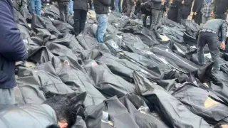 Bodies of Iranian protesters piled up in a makeshift morgue.