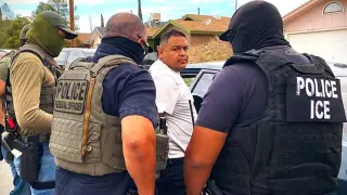 ICE agents in an operation.