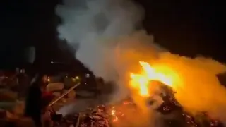 Palestinians in Masafer Yatta, in the occupied West Bank, try to put out fires started by Israeli settlers.