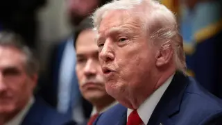 Donald Trump speaks during a cabinet meeting at the White House.