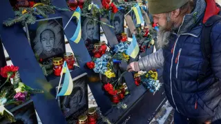 A man visits the monument to the so-called “Heavenly Hundred”, the people who died during the massive Ukrainian demonstrations in favor of the European Union (EU) in 2014.