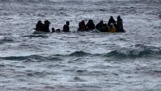 A boat with immigrants near the Greek coast.