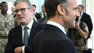 British Prime Minister Keir Starmer and French President Emmanuel Macron during a joint military visit to the MARCOM Centre, maritime command center in Northwood, on July 10, 2025 in London, England.