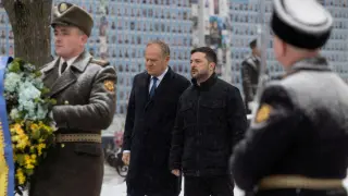 Volodymyr Zelensky and Polish Prime Minister Donald Tusk last week at a tribute to the dead in kyiv.