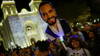 Supporters of El Salvador's president, Nayib Bukele, celebrate his victory in front of the National Palace.